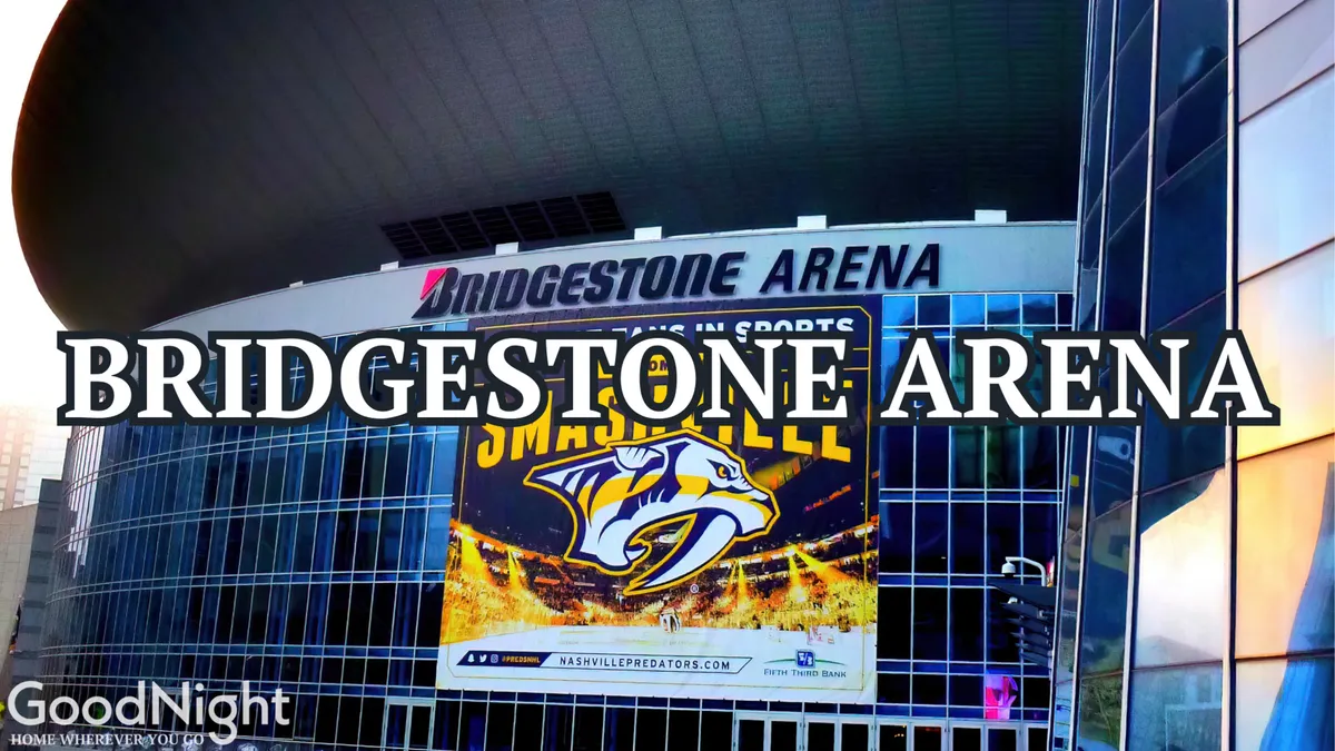 This image showcases the prominent facade of Bridgestone Arena, complete with clear signage and a team logo, set in a lively urban context. The arena is a well-known local landmark and hosts major sports events and concerts, making it a key attraction for visiting families and groups.